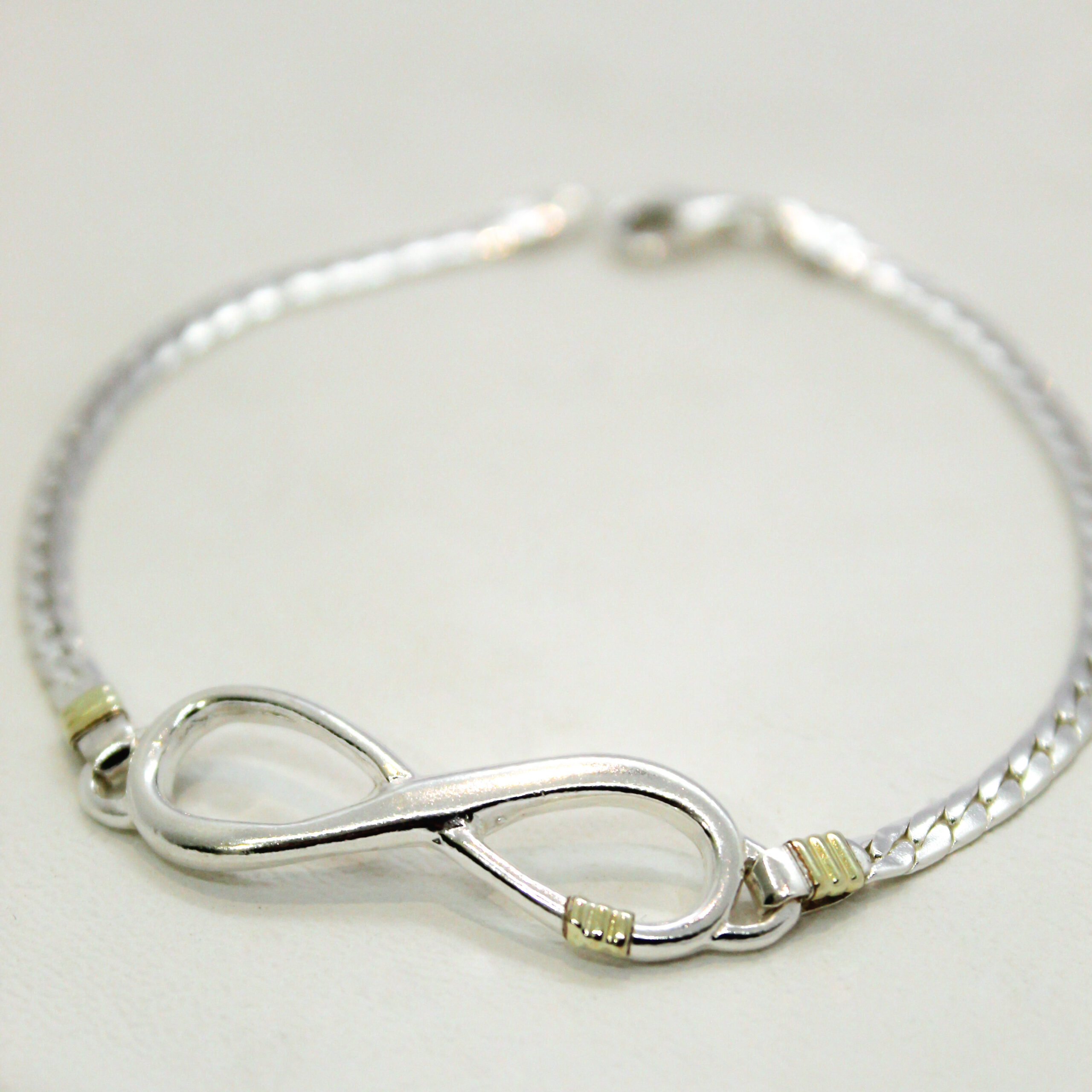Pulsera Infinito Plata y Oro